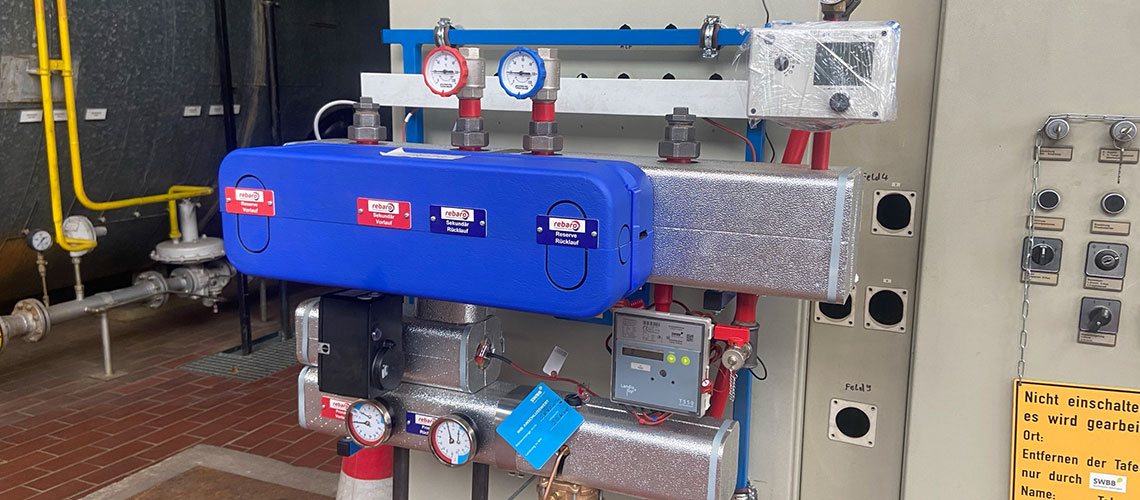 Teil des Smart-Heat-Heizsystems an einer Anlage, symbolisiert das SWBB Projekt ‚Smart Heat‘ für nachhaltige und effiziente Fernwärmeversorgung.